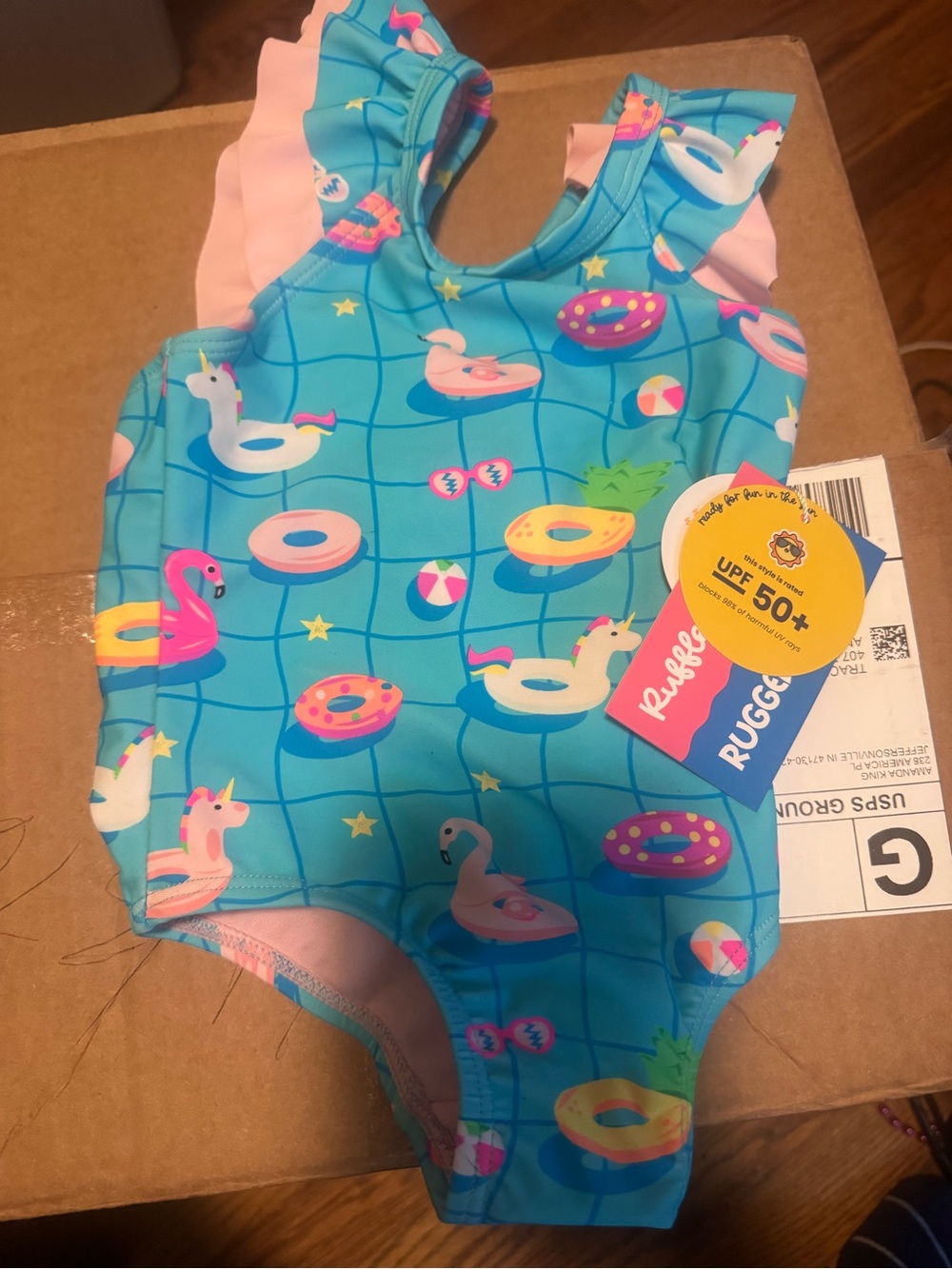 Ruffle Butts Turquoise One-Piece with Pink Ruffle Shoulders & Pool Float Prints